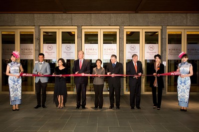 Sands Cotai Central celebrated the completion of Sheraton Macao Hotel's Earth Tower on Monday with a celebrity-hosted ceremony that included drummers, a lion dance, firecrackers and an official ribbon cutting. The addition of Earth Tower's 2,067 new rooms makes the 3,896-room hotel the largest in both Macao and in the global portfolio of Starwood Hotels & Resorts Worldwide, Inc. Second from left to right: Louis Koo; Athena Chu; Edward Tracy, President and Chief Executive Officer, Sands China Ltd.; Maria Helena de Senna Fernandes, Director, Macau Government Tourist Office; Josef Dolp, Managing Director, Sheraton Macao Hotel, Cotai Central; David Sisk, Executive Vice President and Chief Operating Officer, Sands China Ltd.; Anita Yuen